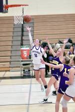 Senior Olivia Shippee drives to the basket in the first half. Photos by William Dimmit.