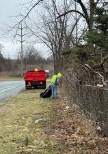Highway Department Begins Spring Cleanup Efforts Pictured below are Highway Department employees working on Larkin Drive recently cleaning up trash and debris. Highway Department employees will continue these clean up efforts on a regular basis throughout the town over the next few months. Photo provided by Town of Monroe.
