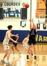 Kyle McDermott, #23, scored 11 points in the game.