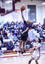 M-W’s Kristopher Bjaelker (#1) led the Crusaders comeback victory in Kingston by scoring six of his nine game points in the game in the fourth quarter.