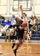 Trayvon McGraw, #21, led the Crusaders to victory with eight points in the fourth quarter.
