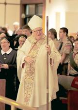 Cardinal Timothy Dolan led the 6 p.m. Nov. 24 Sunday Mass at Sacred Heart Church in Monroe, which was also a celebration of the relocation of the church’s tabernacle to the center of the church altar.