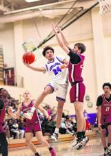 CJ Pearson, #24, drives past a Tiger defender.