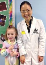 Dr. Se-A Chung, from Alpha &amp; Omega Dental, emphasize the importance of establishing good dental habits for kindergarten and first grade students during her visit to the George Grant Mason Elementary School in Tuxedo.
