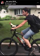 During the lockdown, Johnny trained Eric to ride on his bike handlebars.
