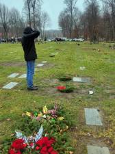 On Saturday, Dec. 18, William Dietrich Dorney of Monroe placed wreaths on the graves of his grandparents, William and Suzanne Dietrich, as part of Wreaths Across America services at the Orange County Veterans Cemetery in Goshen. Photo provided by Daniel Dorney.