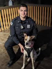 Monroe Police Officer Anthony Luisi rescued Prince the dog after the dog’s chain collar snagged on some wood and tightened around his neck.