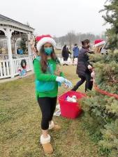 Members of the Monroe-Woodbury Girl Scout Service Unit brightened up the downtown area of Village of Monroe with a special “Bringing Light to a Veteran’s Holiday” tree contest. Provided photos.