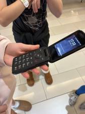 Some parents are opting to give their kids flip phones, which have been seeing a resurgence over the past few years.