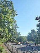 Woodbury Dog Park fence was repaired and solar lights installed in preparation for reopening on August 20.