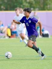 Logan Yamamoto (15) Starts the attack that leads to the Crusaders going up 1-0 early in the game. Photos by William Dimmit.