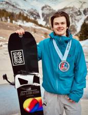 Maxwell Fox Rabdau of Monroe, recently won a bronze medal at the USASA National Snowboarding Championships at Copper Mountain Colorado.