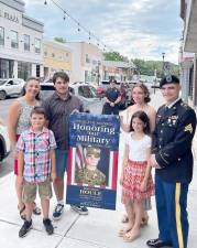 Pictured is the Houle family. Back row: Mother and Town Councilwoman Dorey Houle, Jake and Olivia. Front row: Logan, Olivia and Sgt. Harrison Houle. Not pictured is Dorie Houle’s husband Anthony Houle.