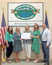 Pictured from left to right are: Jennifer Schnaars, Secretary to the Supervisor, Elizabeth Rowley, President and CEO, Community Foundation of Orange and Sullivan, Ann Marie Morris, Senior Center Director and Parks Department Head, Nicole Feller Lee, Director of Development &amp; Communications, Community Foundation of Orange and Sullivan, and Tony Cardone, Town of Monroe Supervisor. Councilman Sal Scancarello was unavailable for the presentation. Photo provided by the Town of Monroe.