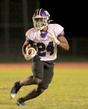 Crusader Eryk Shammgod rushed for 143 yards and scored two touchdowns in the game. Photos by William Dimmit.