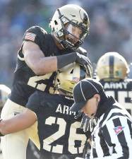 Army football removes motto from spirit flag