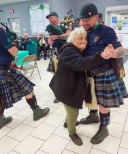 “This is our wonderful Senior Lily,” Woodbury Supervisor Kate Luciani said. “She was dancing with her walker with the Shields band when the one member put down his drum to dance with her. Was a moment that everyone in the room felt in their hearts.”