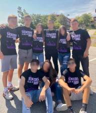 Members of the Monroe-Woodbury High School Class of 2021 held an impromptu celebration of their Senior Day on the first day of school on the high school campus without observing social distancing or wearing protective masks.