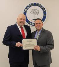 Orange County Executive Steven Neuhaus (right) and Citizen of the Month awardee James Ferrigno.