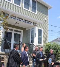 At the courthouse dedication to Edward J. Kellman, Senator James Skoufis speaks to Woodbury officials and others gathered there.