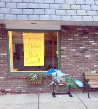 Linda Mabie, owner of Linda’s Office Supplies &amp; Gifts, has announced that local business owners, Kevin and Roxanne Brand, have opened The Goshen Mailroom in Linda’s former location at 22 West Main St., Goshen. Photo by Beth Quinn.
