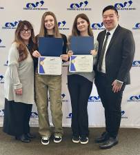 Pictured from left to right are George F. Baker High School Art Teacher Michelle Foligno, junior Ava Resner, junior Kayleigh Donnelly and Music Teacher Clayton Chan. Photo provided by the Tuxedo School District.