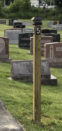 For his community service project, Michael Brian Lacuna presided over making a map of the veterans buried in St. Anastasia Church cemetery and erecting row markers to help family and friends easily find their loved ones who were buried there. More than 500 veterans are buried in this cemetery.