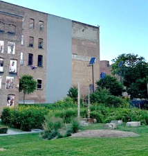 The mural wall and adjacent park at Safe Harbors Green.