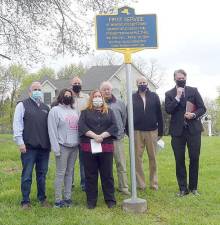 The Monroe Historical Society dedicated an historic marker on Sunday, April 25, at the site of where the first Presbyterian service ever held in the town of Monroe took place off Reynolds Road under an apple tree on April 20, 1783. A month later, May 28, 1783, the framework of the church at Seamamville was raised. The plaque was donated by Joseph M. Dierna, the former president of Orange and Rockland Realty Corporation in Monroe who died Jan. 25, 2020. Picture at the historic marker’s unveiling are: Monroe Supervisor Tony Cardone, Monroe Village Trustees Dory Houle, Debbie Behringer and John Karl, Monroe Town Historian Jim Nelson, Monroe Mayor Neal Dwyer and Pastor Jonathan Hoeldtke. Photo by G. Carni.