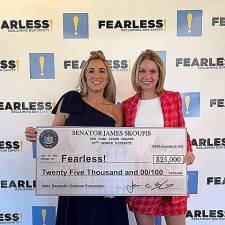 Skoufis’ Chief of Staff, Christie Foster, presents $25,000 in domestic violenec prevention funding to Fearless! Executive Director Kellyann Kostyal-Larrier at the organization’s Nov. 20 brunch.