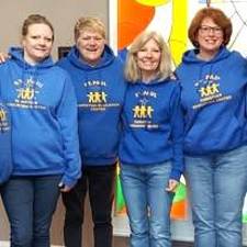 Pictured (L to R): Heather TInger, Ramona Adams, Susan Falasca and Karen Reina. Adams is retiring as director after 26 years.