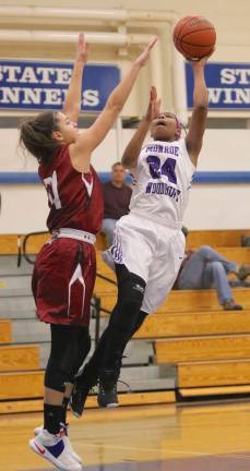 Taylor Neely (#24) drives to the basket against Nyack.