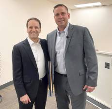 National security expert Vance Serchuk and Orange County Exectuive Steven Neuhaus.