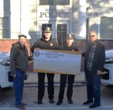 From left: Village of Mayor Neil Dwyer, Lt. Timothy Young, Chief Darwin Guzman and NYS Assemblyman Chris Eachus.