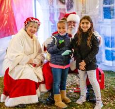 Adriana and Kaila of Monroe stop by Monroe's Winter Fest to see Santa. Photos by Sammie Finch.