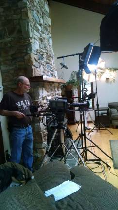 Monroe resident Simon Fridlich has worked with Hudson Valley International Film Festival organizer and director Charles Marinaro on three films, including &quot;Savior,&quot; which will be shown at the festival on Friday, Aug. 14. Here he is shown working on their latest production &quot;Irony of Catharsis.&quot;