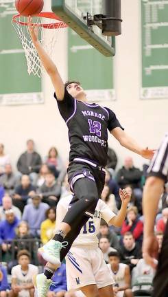 Dan Quinones gets to the hoop for two points against the Wizards.