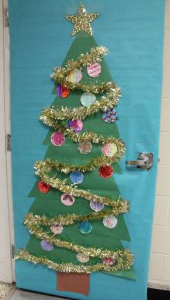 This is the first-place tree decorated door.