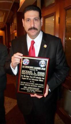 Woodbury Town Councilman Michael Essig has been awarded The Law Enforcement Leadership award by the New York State Fraternal Order of Police Court Officers Memorial Lodge 35.
