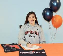 Monroe-Woodbury High School senior Meghan Catherwood signed a National Letter of Intent to attend and dive for Division 1 Bucknell University. Provided photos.