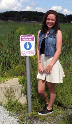 Provided photo by Monroe-Woodbury High School Megan Midtbo designed "Reserved Parking for Expectant Mothers" signs that are now in place in various locations in the Monroe-Woodbury School District, Village of Monroe, Town of Monroe and in Smith Clove Park as part of her Girl Scout Gold Award community project.