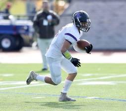 Senior Nick Scancarello returns a kickoff in the second quarter.