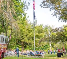 Tim Mitts addresses the crowd gathered at Rest Haven in Monroe for the dedication of the flagpole at the site of the former home for the blind where author and teacher Helen Keller has great impact on those who lived there. Photos by Sammie Finch.