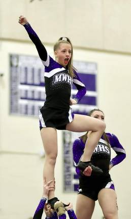 Gianna Miale caps off top of her routine with attitude.