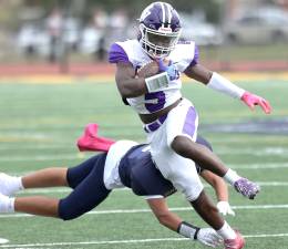 Nate Coulanges steps past a Pine Bush defender on his way to the end zone in the third quarter.