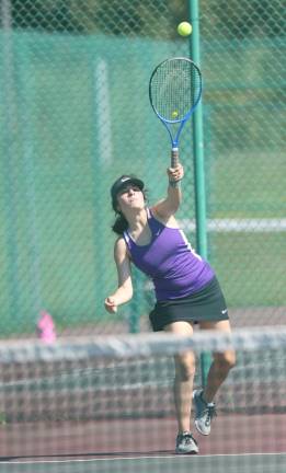 Alyx Sperling serving, and her partner Ava Donagher went on to a 6-3, 6-1 victory in #2 Doubles