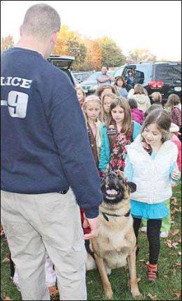 K-9 unit teaches Monroe Girl Scouts about their police work