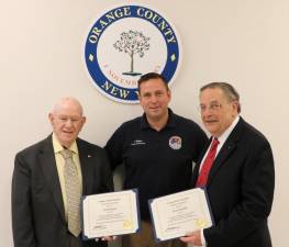 From left, Charlie Pakula, Orange County Executive Steven M. Neuhaus and Paul Campanella.