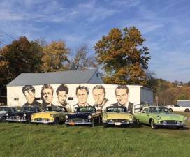 Cool cars on display by Rocco Manno’ mural of well-known Hollywood actors on Kings Highway between Sugar Loaf and Warwick.