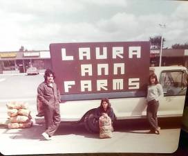 Anthony, Laura Ann and Doreen Cuomo (left to right) began Laura Ann Farms in 1973 with this pickup truck.